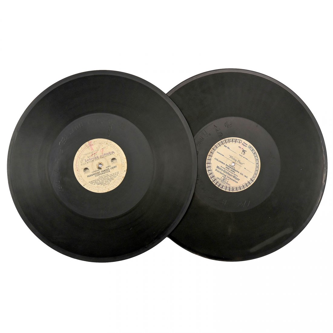 2 Rare Soundfilm Discs, 1929: 2 Rare Soundfilm Discs, 1929 To the film "Flying Fleet", Ø 16 in., inside out cut. 1) Act 5, Columbia Phonograph Co., Metro-Goldwyn-Mayer. – And: 2) Act 9, Eigentum der Parufamet, Paramount Picture