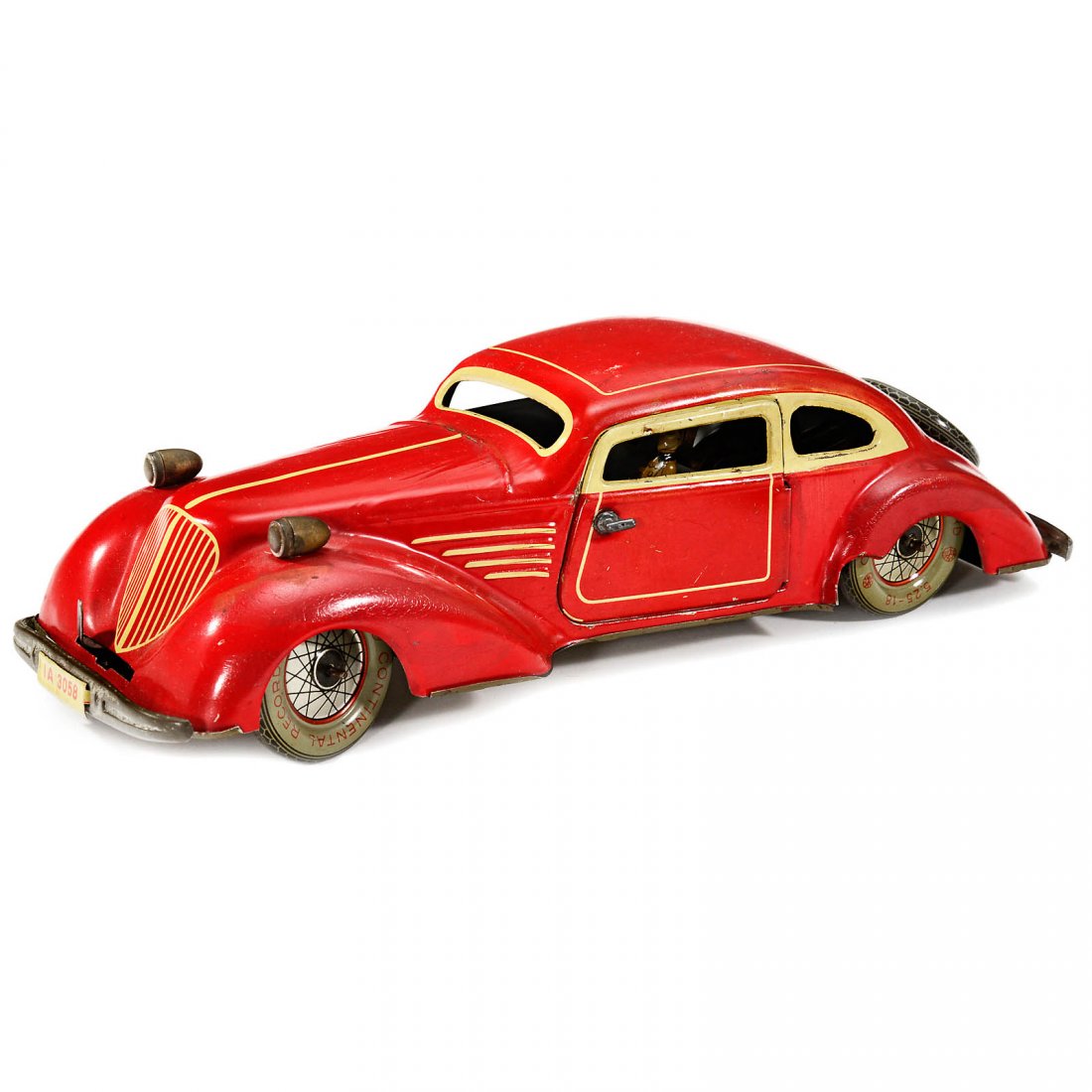 Distler Streamline Roadster IA 3058, 1935: Distler Streamline Roadster IA 3058, 1935 Johann Distler, Nuremberg. Lithographed tin, clockwork (working), driver figure, 2 opening doors, length 12 ½ in. Distler Stromlinienauto IA 3058, 1935 Johan
