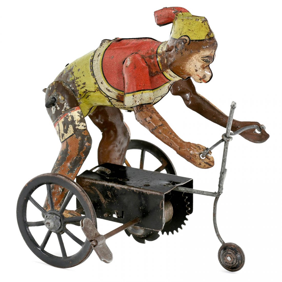 Monkey on Tricycle – An Early German Tin Toy, c. 1915: Monkey on Tricycle – An Early German Tin Toy, c. 1915 Unmarked, probably manufactured by Issmayer, lithographed, spiral spring drive (working, but sticks), length 4 ¾ in. Rare! Frühes deutsches B