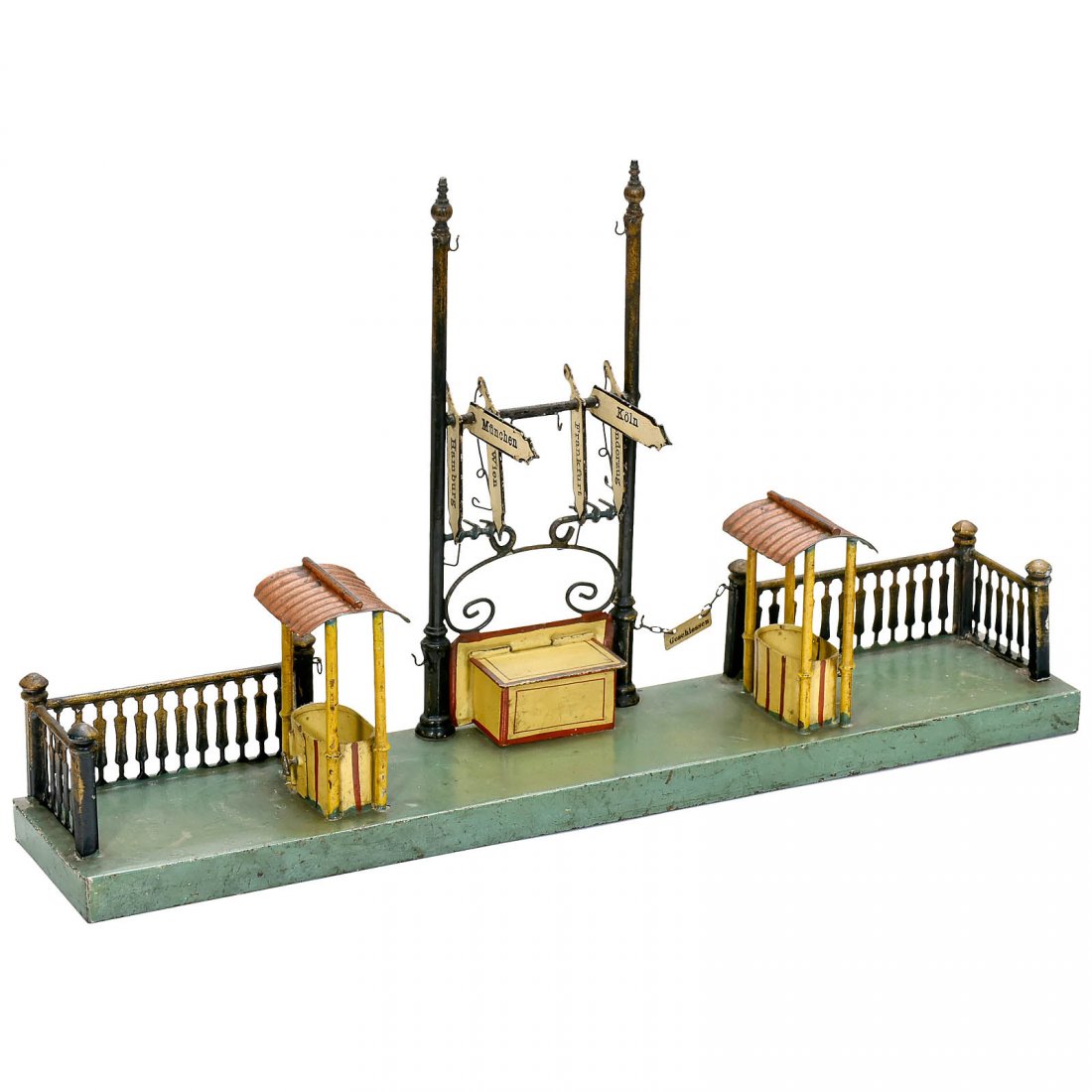 Märklin No. 2166 Platform Barrier and Train-Indi-cator,: Märklin No. 2166 Platform Barrier and Train-Indi-cator, c. 1904 Hand-painted tin, 6 direction signs, 17 ¾ x 3 ½ in., original paint! Bahnsperre mit Kontrollhäuschen Märklin No. 2166, um 1904 Gel�