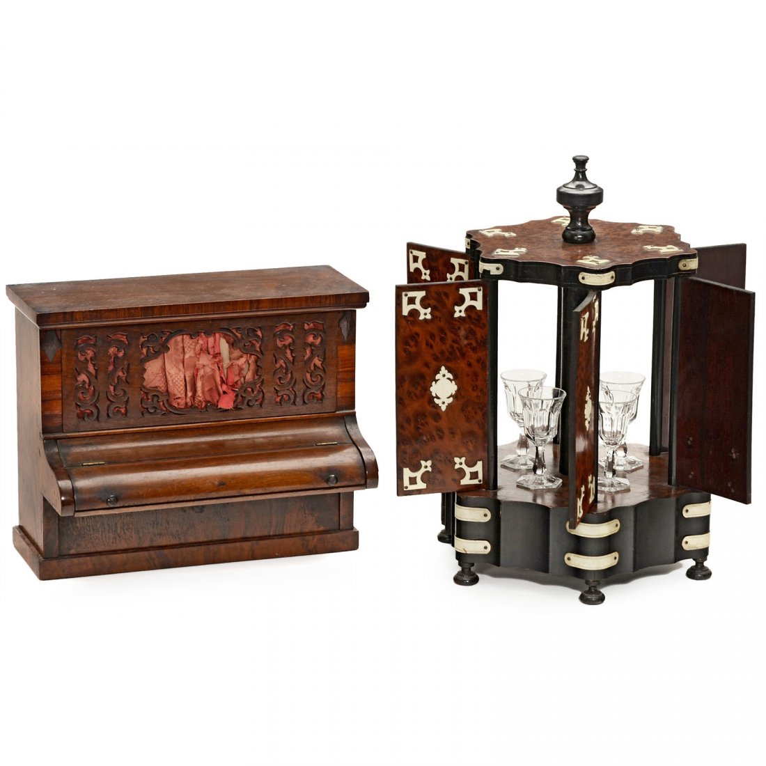 2 Musical Novelties, c. 1890: 2 Musical Novelties, c. 1890 1) Thuya-veneered musical liquor cabinet with 2-air movement, 6 doors with carved bone decoration and 4 glasses, height 14 in. (35,5 cm), working order but missing key. ��