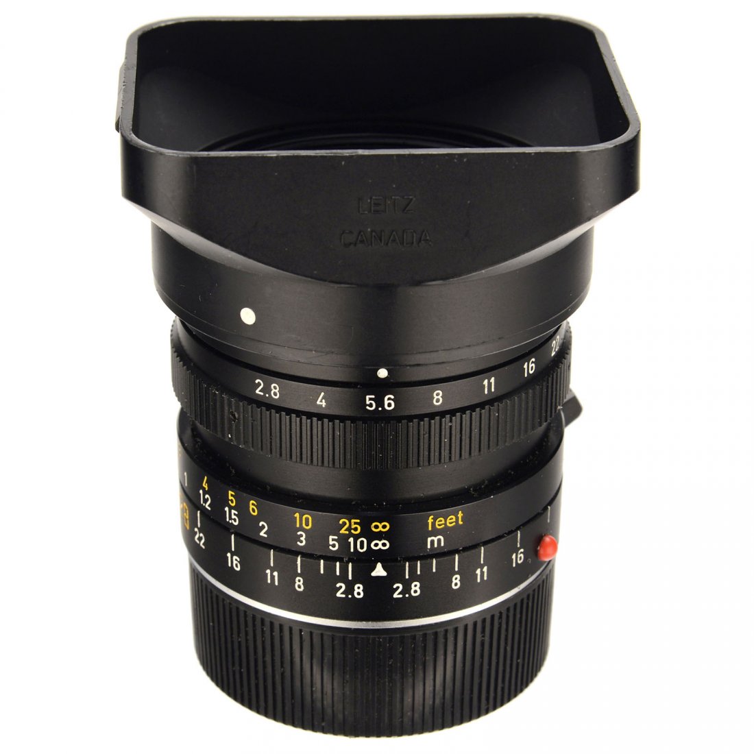 Leitz Elmarit-M 2,8/28 mm: Leitz Elmarit-M 2,8/28 mm Leitz, Canada. No. 3041019, third computation, for E49 filters, Newton rings set into optics. Complete with caps, lens hood 12536 and box. Leitz Elmarit-M 2,8/28 mm Leitz, Ca