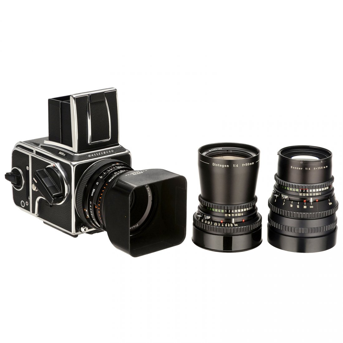 Hasselblad 503 CXi with 3 Lenses: Hasselblad 503 CXi with 3 Lenses Hasselblad, Sweden. 1) Hasselblad 503 CXi body, chrome, no. 11EC36963, 1995, with waist-level viewfinder and magazine A12, box, excellent condition! (1–2/1) – 2) P