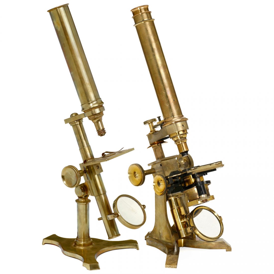 2 English Brass Compound Microscopes: 2 English Brass Compound Microscopes 1) Signed on the splayed foot: "J. Amadio, 7 Throgmorton St., London". Patinated brass, tilting stand with compass joint, single mirror on gimbal, sprung stage, ra