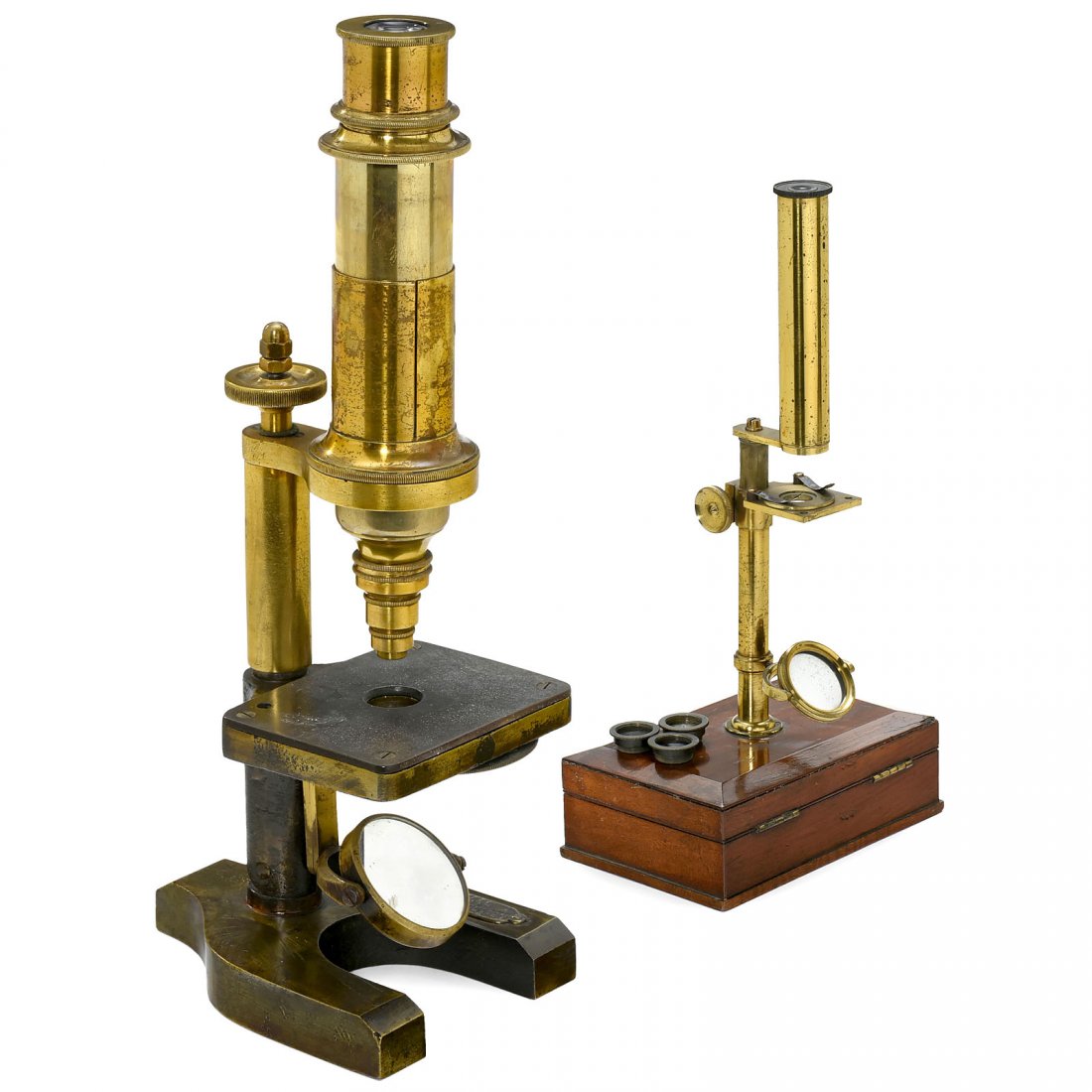 2 Brass Compound Microscopes: 2 Brass Compound Microscopes 1) Klöne & Müller, Berlin. Compound microscope, plaque at the horseshoe base signed: "J. Klöne & G. Müller, Berlin", original lacquered and bronzed brass, double mirro