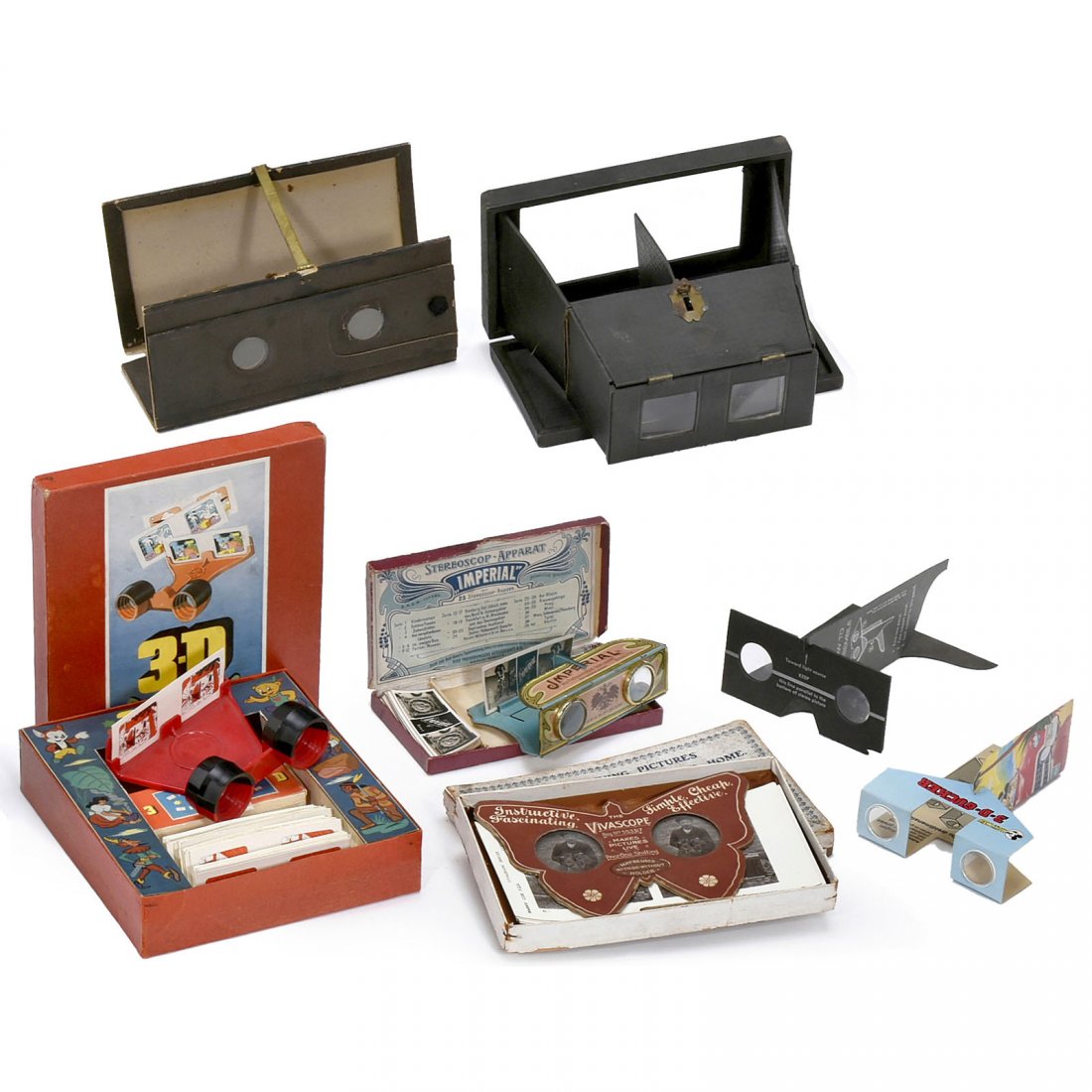 8 Stereo Viewers: 8 Stereo Viewers 1) Neue Photographische Gesellschaft, Berlin. Imperial Sterescop. Printed folding stereo viewer for stereo cards of 3 x 7 cm. With 23 cards (museums in Paris) and original box. (3/3) 