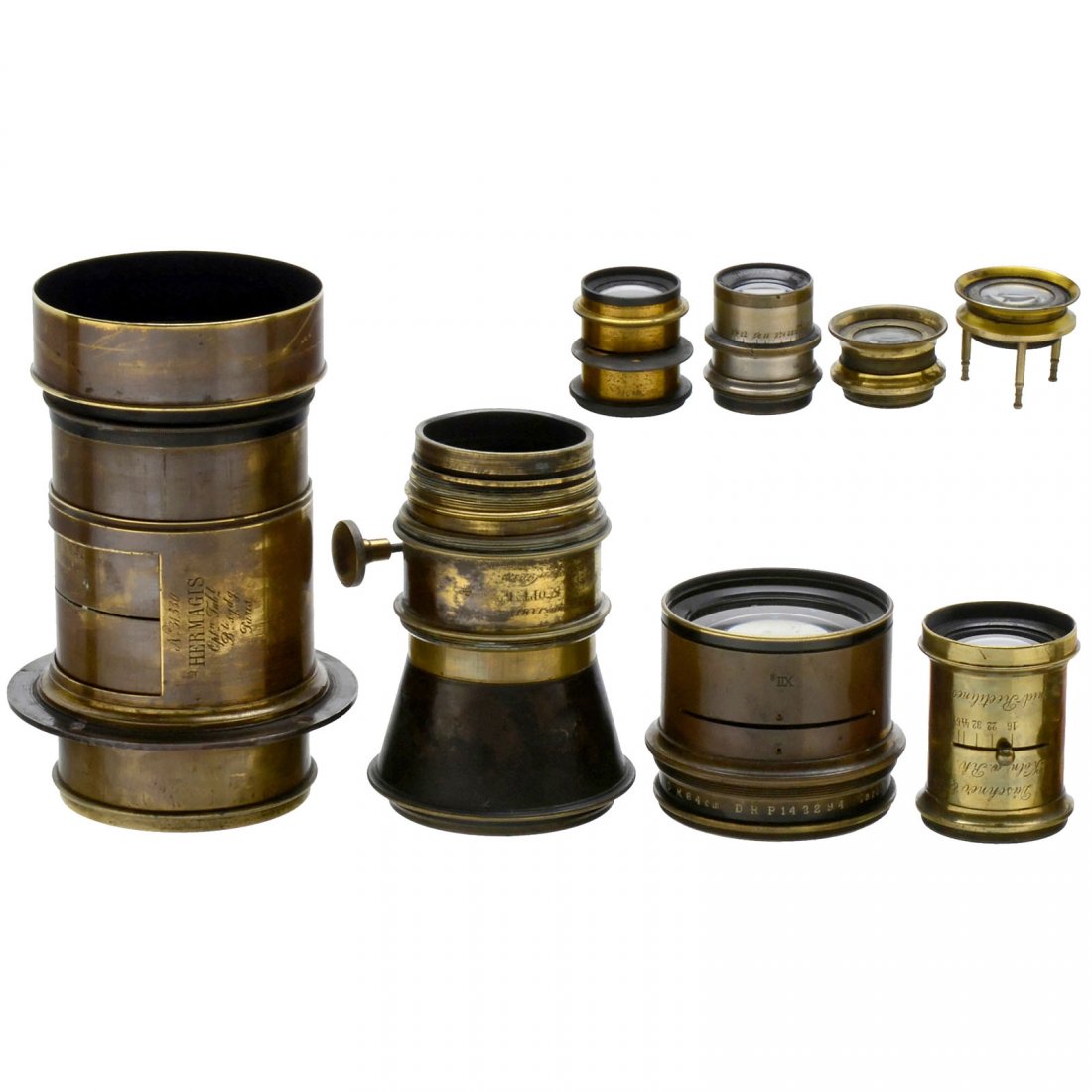 8 Brass Lenses and Magnifying Glasses: 8 Brass Lenses and Magnifying Glasses 1) Hermagis, Paris. "Objectif pr Portrait No. 5", approx. 18 cm focal length, for waterhouse stop, rack-and-pinion focusing missing, connecting ring, height 7,5 i