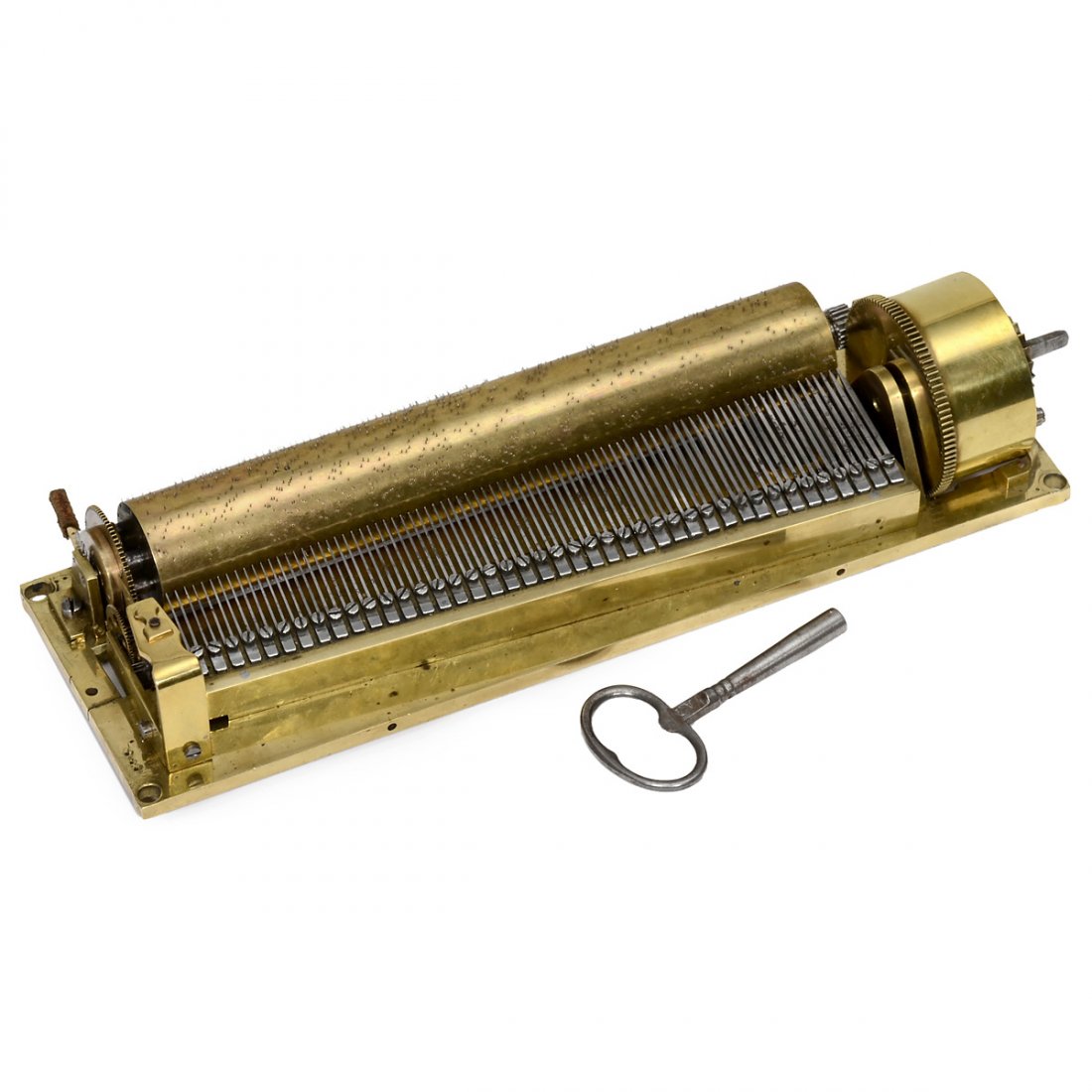 Early Key-Wind Musical Movement, c. 1825: Early Key-Wind Musical Movement, c. 1825 Probably Vienna or Prague, playing four airs, with 42 groups of 2 teeth in sectional comb (complete), bass teeth to the right, brass bedplate with punched numb