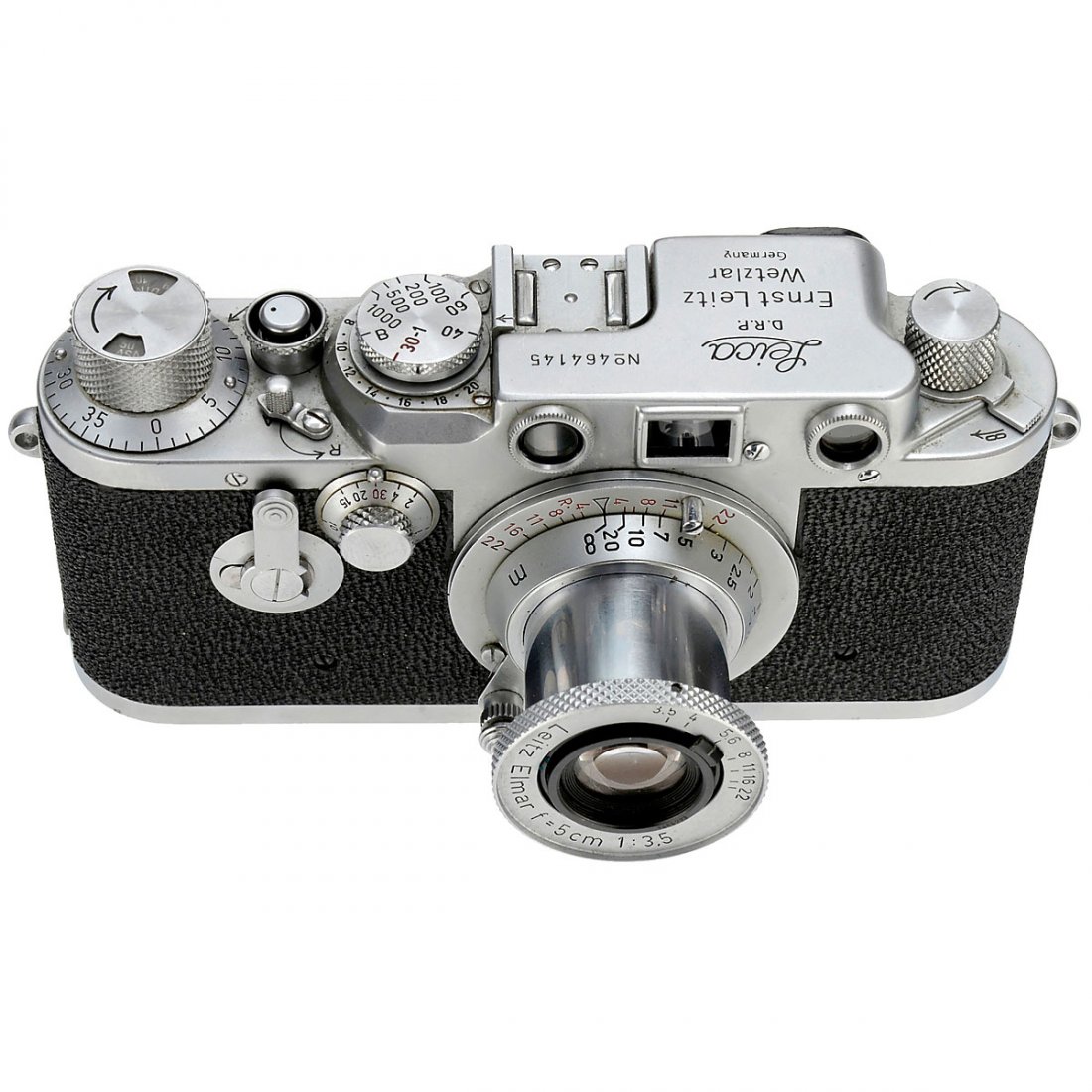 Leica IIIc/IIIf, 1949: Leica IIIc/IIIf, 1949 Leitz, Wetzlar. Leica IIIc, no. 464145, converted to Leica IIIf, sharkskin vulcanite, self-timer. Elmar 3,5/5 cm, no. 1455203, red scale, front cap. With tall case. Leica IIIc/II