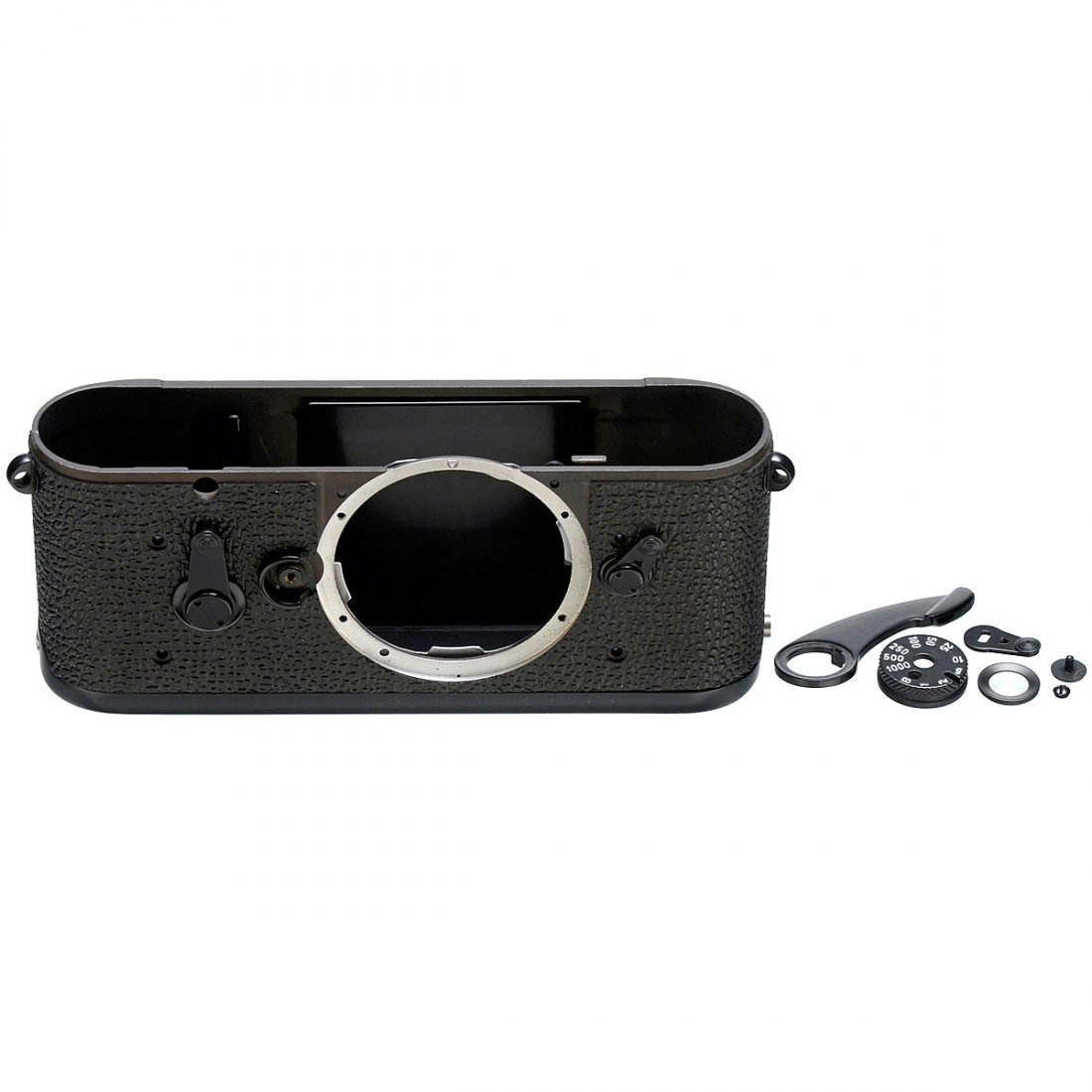 Leica M3 "Black Paint" Housing: Leica M3 "Black Paint" Housing Leitz, Wetzlar. Original spare parts for Leica M3 in black paint, with baseplate, shutter speed ring, advance lever, ocular, self-timer lever and screw for rewind knob. 