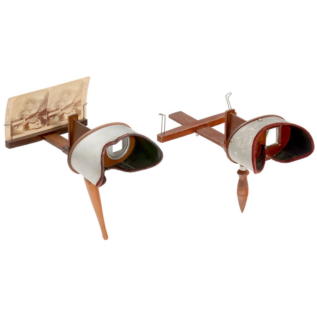 2 Stereo Viewers System Holmes, 1897 onwards: 2 Stereo Viewers System Holmes, 1897 onwards 1) Unmarked, stamped: "Pat. April–Sep. 1897", stereo viewer from aluminum and wood for cards of 9 x 18 cm, prismatic oculars, focusable. (3+/2) – And: 
