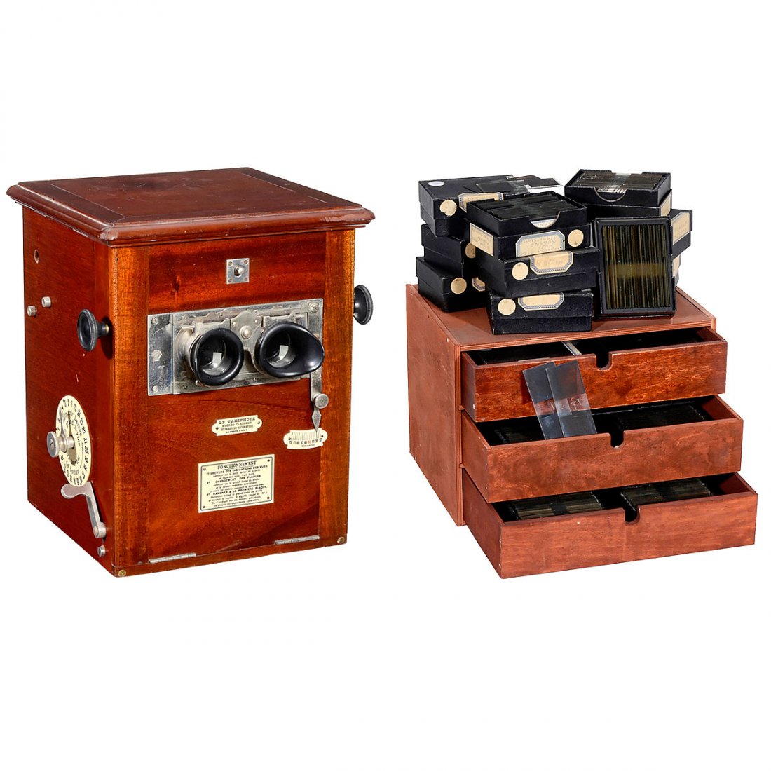 "Taxiphote" Table Stereo Viewer, c. 1910: "Taxiphote" Table Stereo Viewer, c. 1910 Optical model, manufactured by Jules Richard, Paris. For slides of 45 x 107 mm. Tropical wood case with nickeled-brass fittings, height 11 ¾ in. With 26 trays