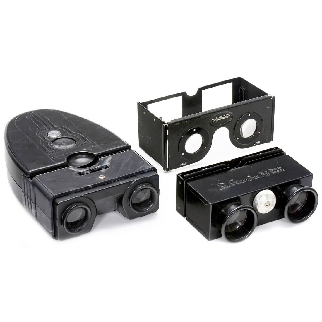 3 Stereo Viewers: 3 Stereo Viewers 1) Voigtländer, Braunschweig. Foldable stereo viewer for cards and slides of 45 x 107 mm, focusable by displacement of pictures, c. 1930. – 2) Rada Standard II, viewer for image si