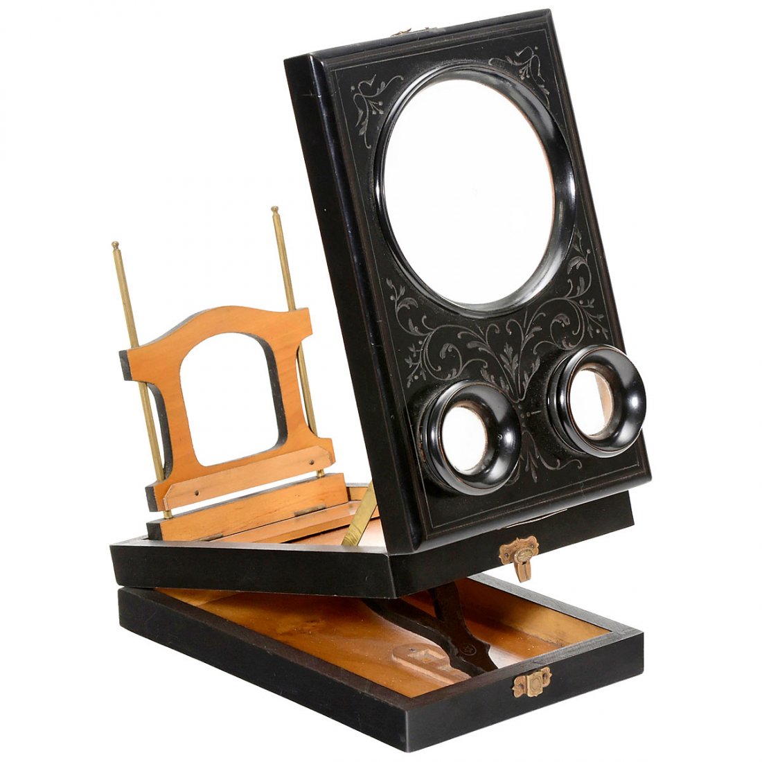 French Stereo Graphoscope, c. 1890: French Stereo Graphoscope, c. 1890 Marked "E. Hautecceur, 35 Avenue de l'Opéra 35 Paris", black-lacquered wooden body with incised decoration, lens Ø 4 in., oculars Ø 1 1/6 in., for stereo cards of