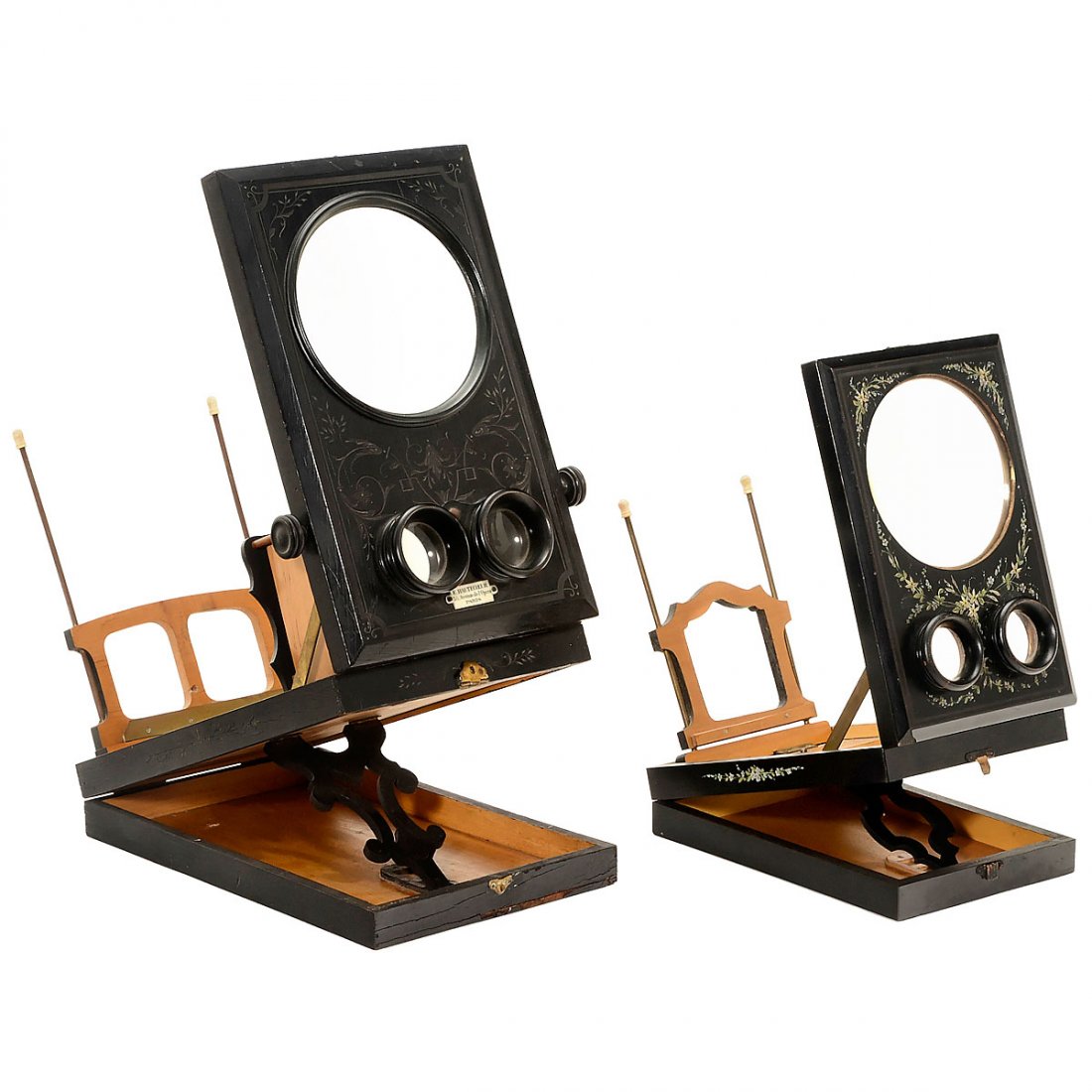 2 Stereo Graphoscopes: 2 Stereo Graphoscopes 1) E. Hautecceur, 35, Avenue de l'Opera, Paris, c. 1880, black lacquered body with incised decoration, for stereo cards and slides of 9 x 18 cm and other formats, high-class ocul