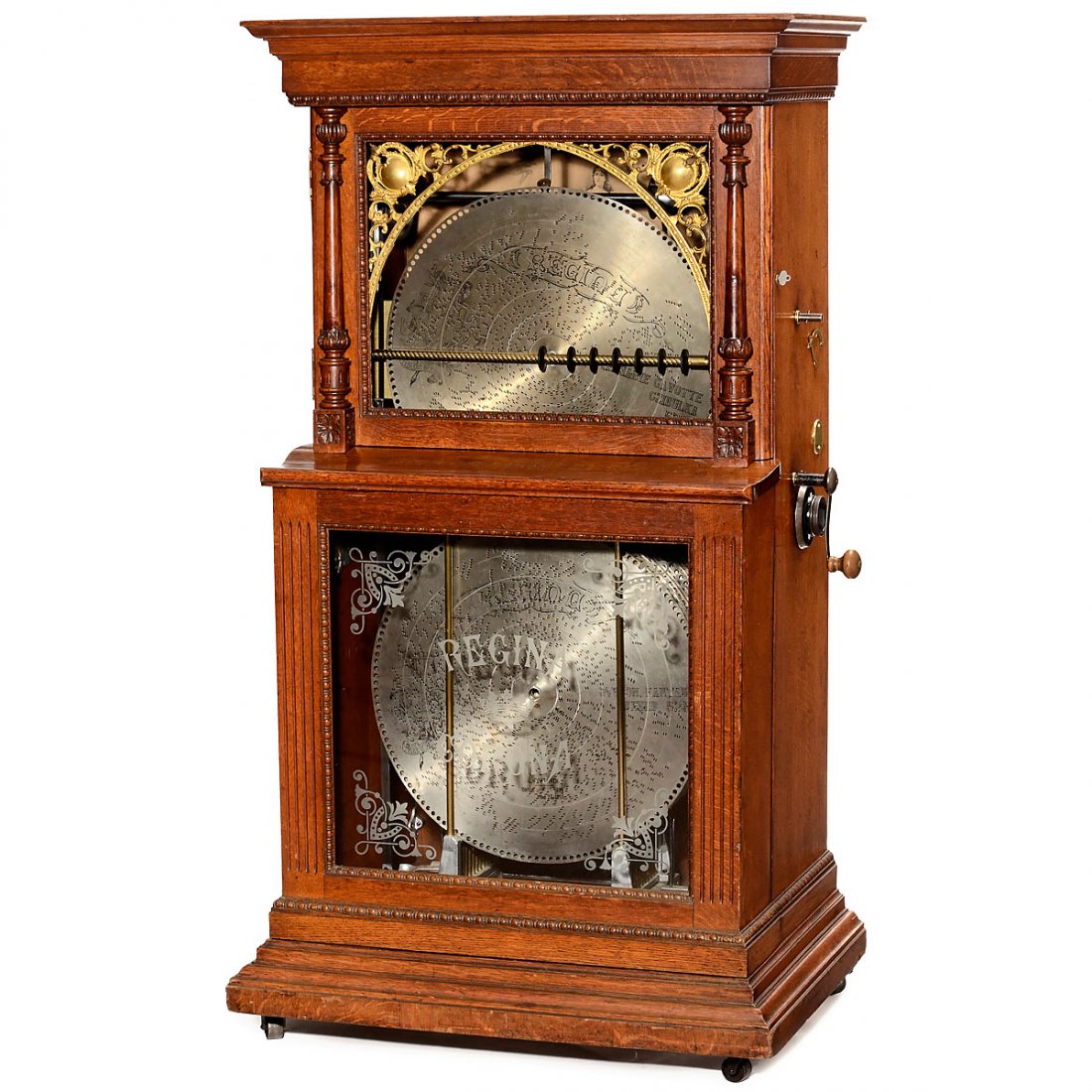 Regina Corona Style 31 Automatic Disc-Changing Musical: Regina Corona Style 31 Automatic Disc-Changing Musical Box for 12 Discs, c. 1900 Manufactured by Regina Music Box Co., Rahway, New Jersey. The official parlour model without coin slot, 20 ¾-inch dis