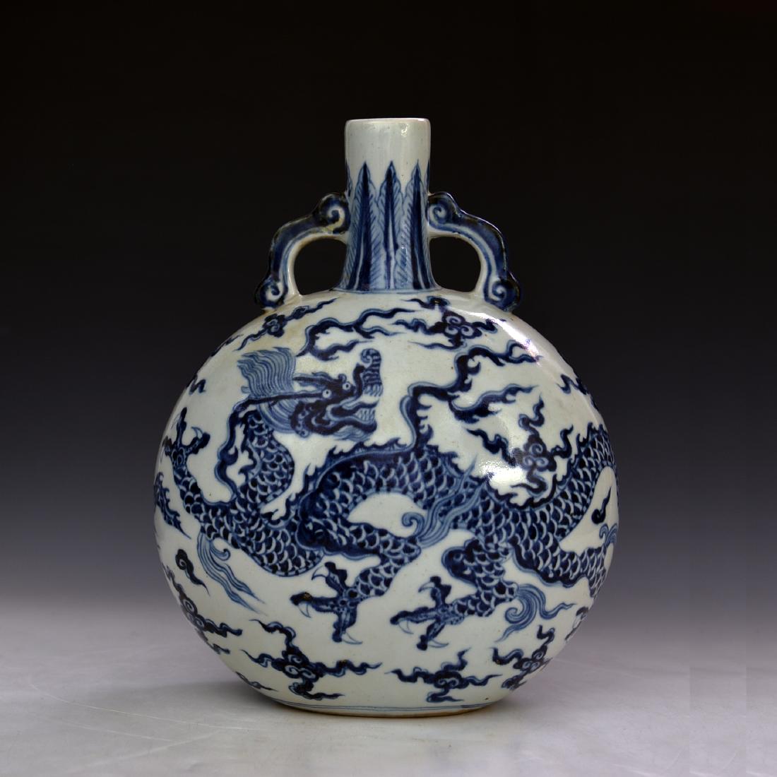 CHINESE BLUE AND WHITE MOON FLASKS: CHINESE BLUE AND WHITE MOON FLASKS, DECORATED WITH DRAGON AND CLOUND, GOOD CONDITION; H: 12 5/8 IN W: 10 IN