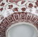 A COPPER RED BOWL WITH RED TWIGS AND PEONIES PATTERN - 7