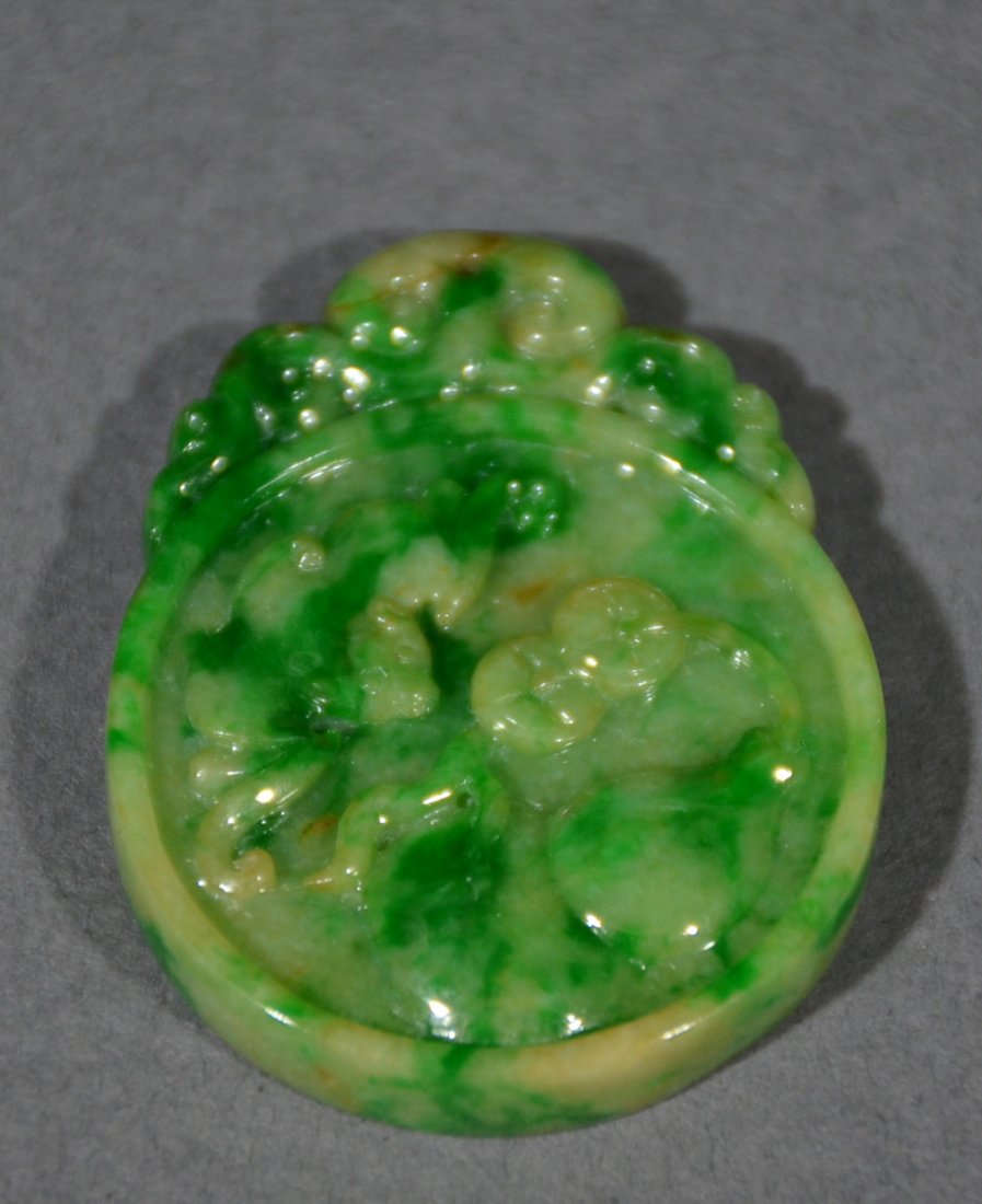 A CARVED JADEITE PENDANT OF RUYI (1 of 6)