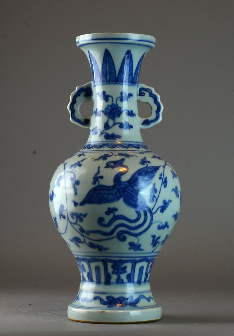 A Ming dynasty blue and white vase: H 12"