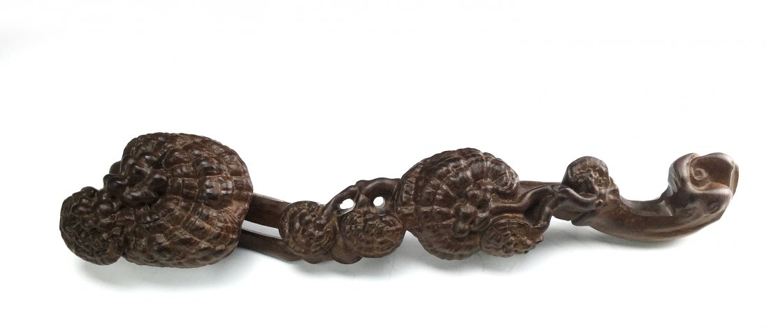 Chinese ChenXiang Wood Ruyi Scepter: Chinese ChenXiang wooden ruyi scepter, the branch accented with small sprigs of lingzhi; L: 14.5 in
