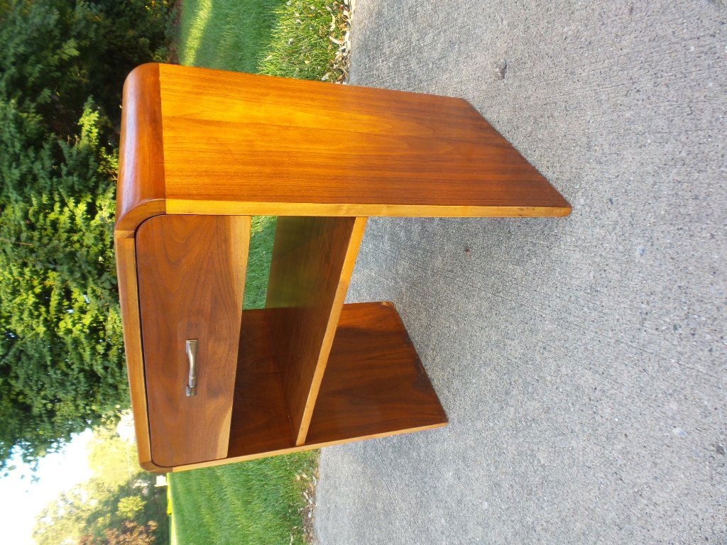 Gilbert Rhode era art deco waterfall night stand: Gilbert Rhode era American art deco streamline waterfall sides walnut wood sculptural nightstand. featuring a rare art deco sculptural design with two tiers, single pull out drawer. Beautiful Walnut w