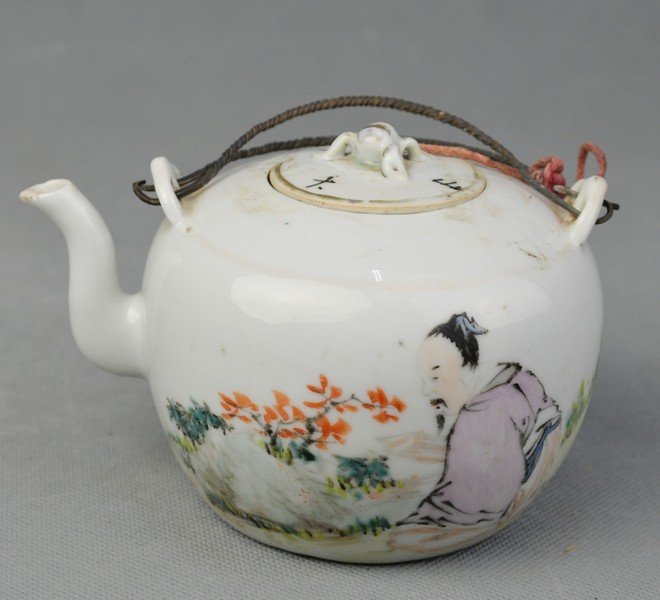 A Famille Rose Teapot of Figure Pattern: A Famille Rose Teapot of Figure Pattern 4 2/1" x 3 3/4"