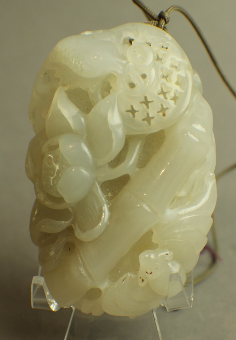 An White Jade Handpiece Carved in Banboo and Lotus (1 of 3)