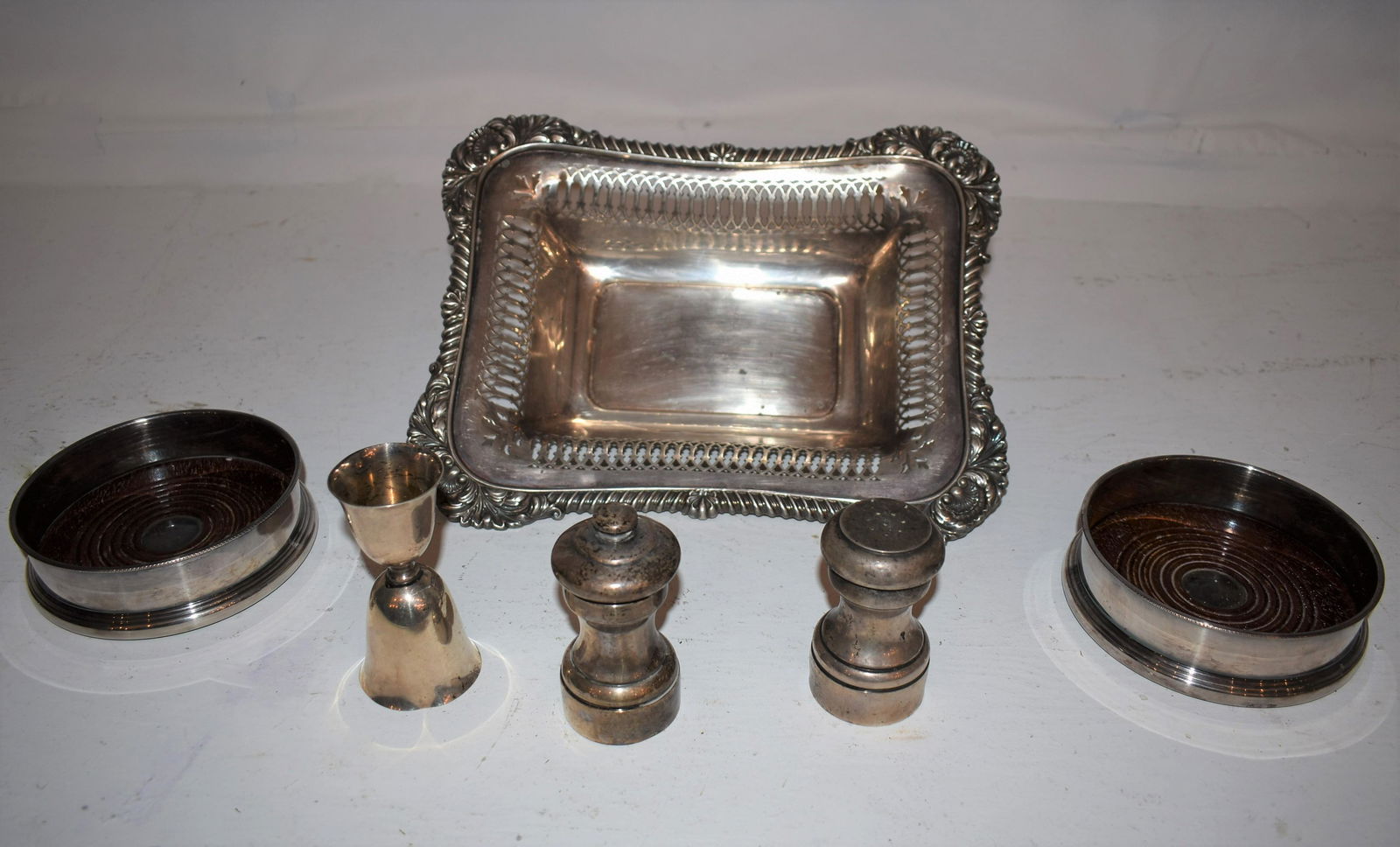 Sterling Cocktail Measure: French sterling salt & pepper shakers, Sheffield open serving dish and pair of Barker Ellis wine coasters. Weight of cocktail measure Serving dish 9 1/2" x 12"