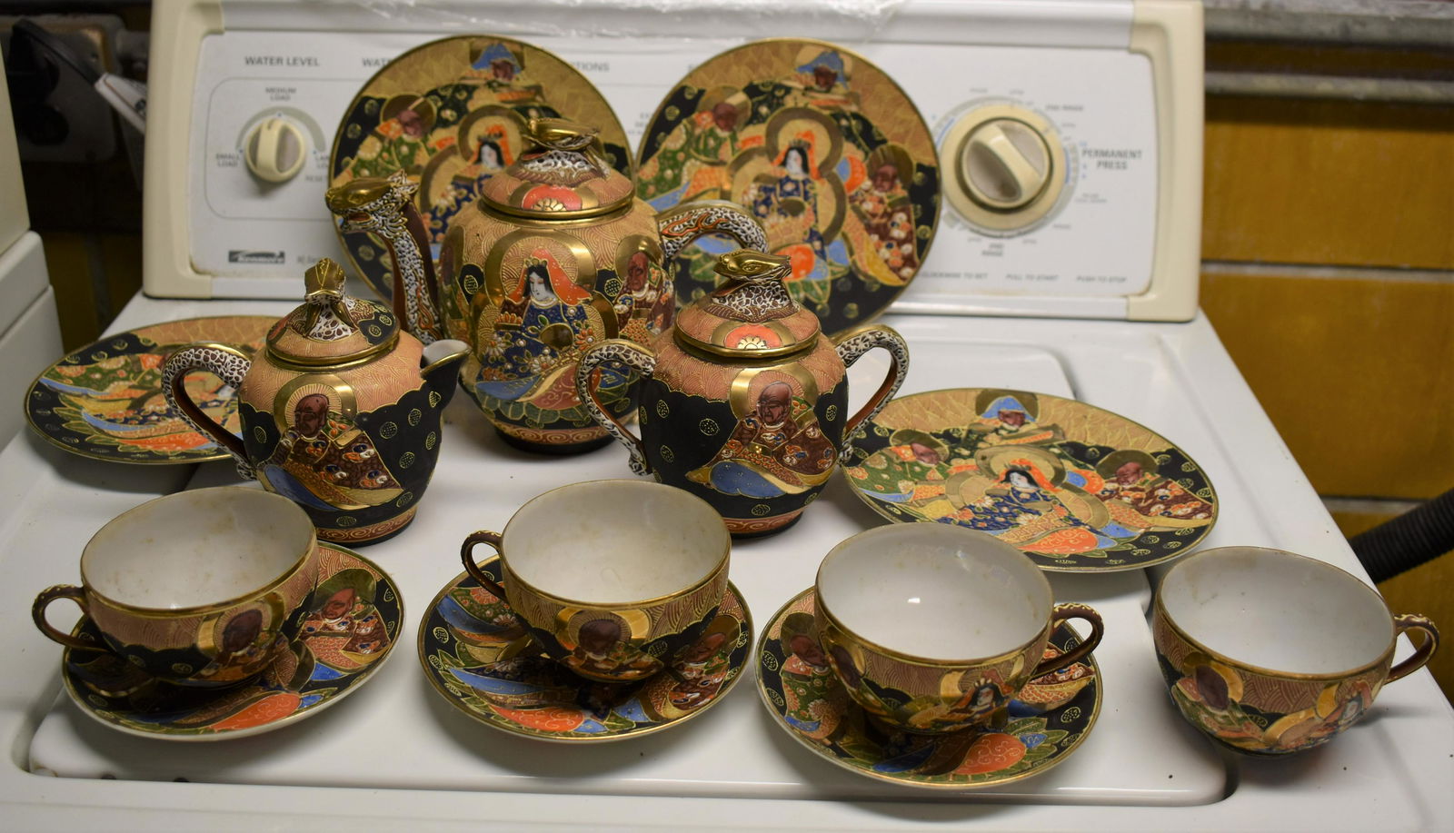Japanese Satsuma Tea & Coffee Service: consisting of a coffee & teapot, covered sugar, four small plates four cups and three saucers