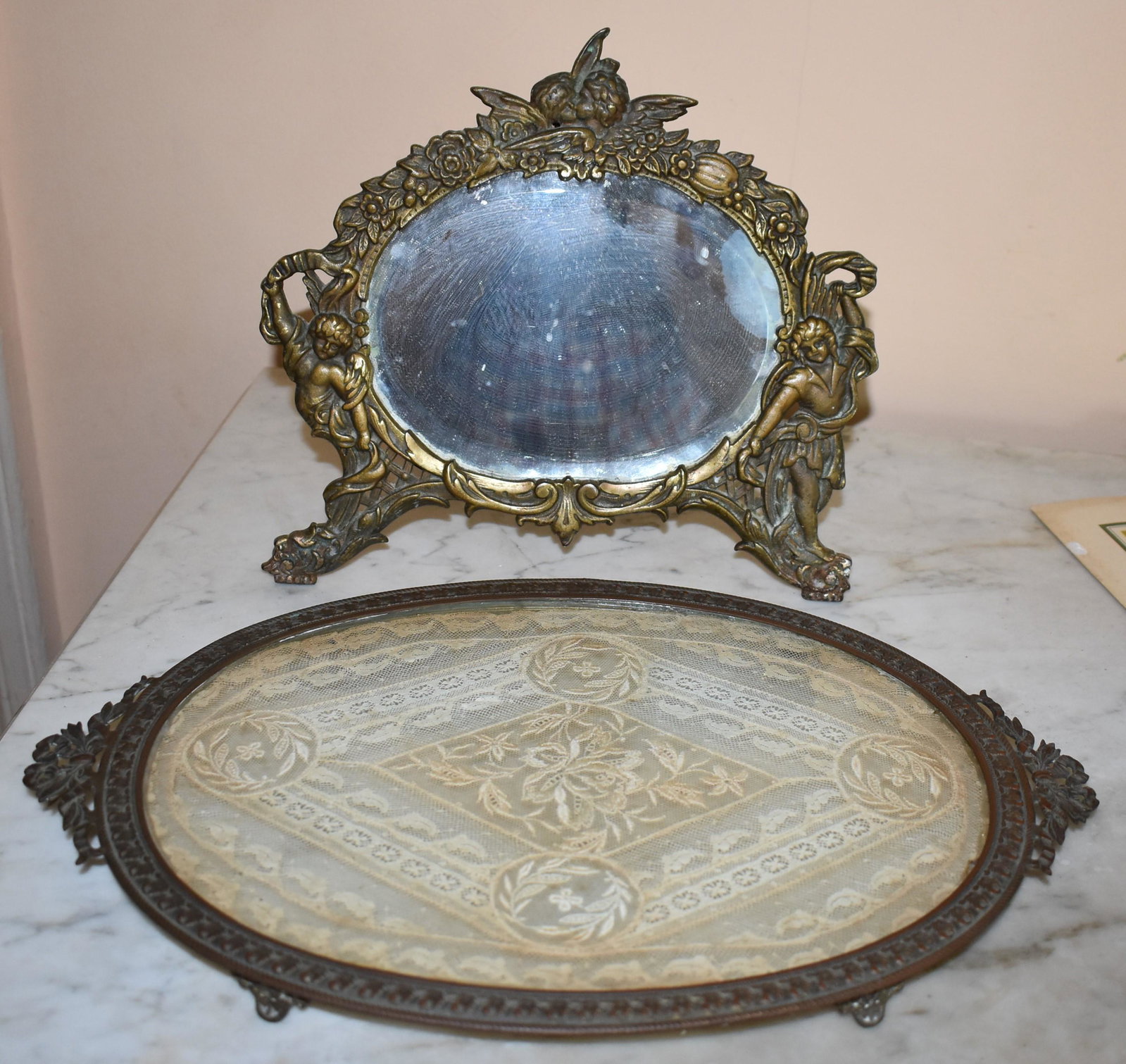 Victorian Brass Easel Back Mirror: and French style oval footed tray with Belgian needlework. Mirror Ht. 9” W. 15”