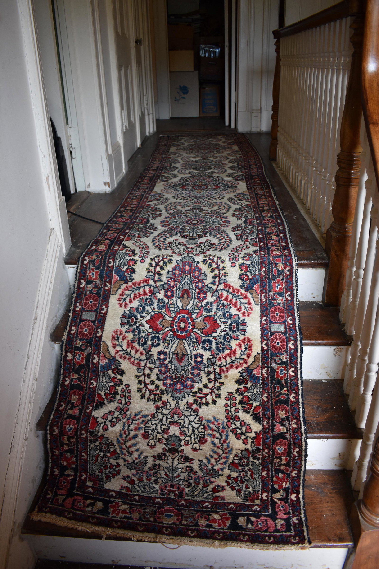 Hamadan Runner 2' 8" x 12' 5": ivory field with repeating floral medallion design.