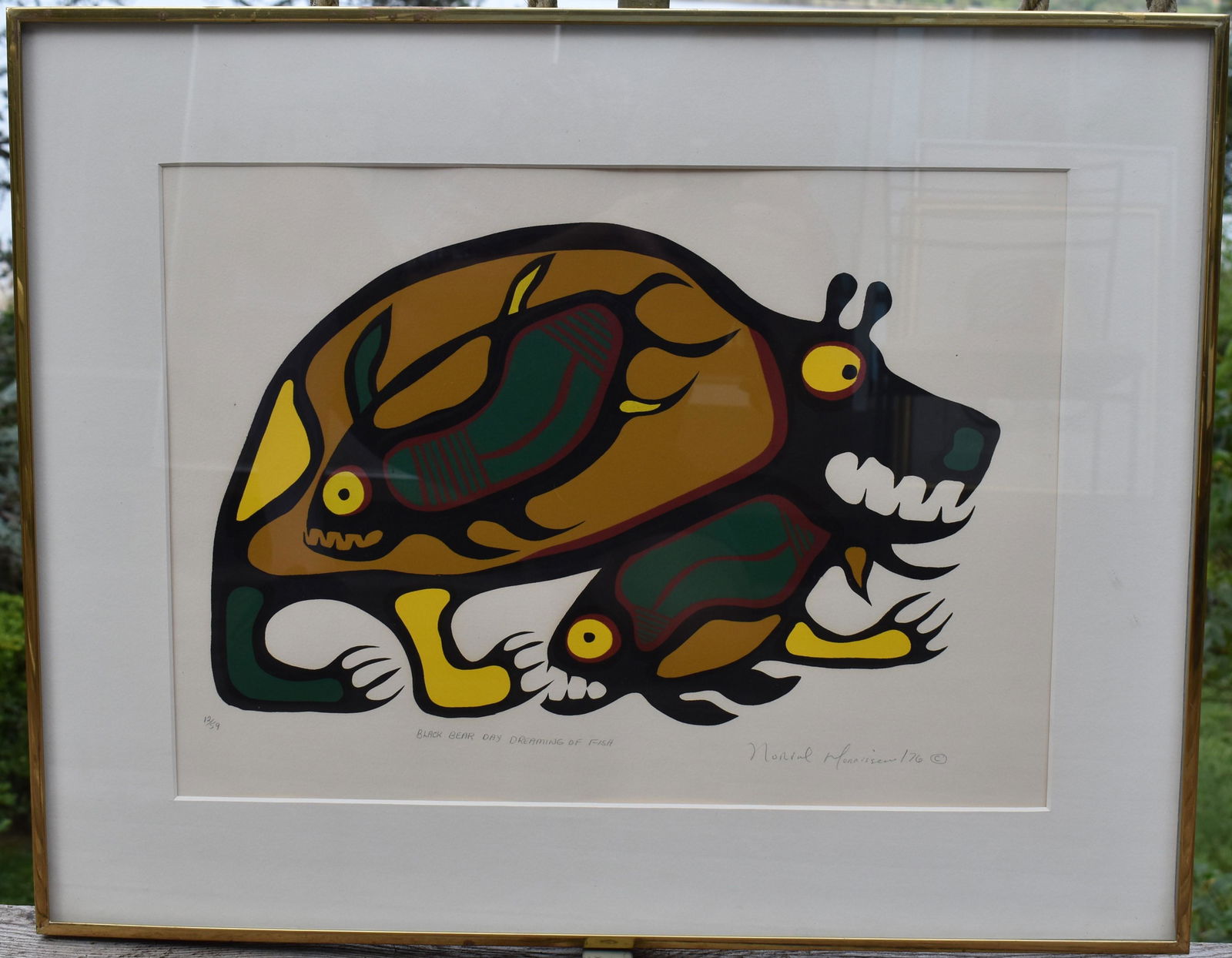 Norval H. Morrisseau (Native Canadian, 1931-2007): Black Bear Day Dreaming Of Fish"Silkscreen, signed titled and numbered, 12/59 dated 1976 Sight size: 13” x 18” Overall: 19 ¼” x 24 ¼”