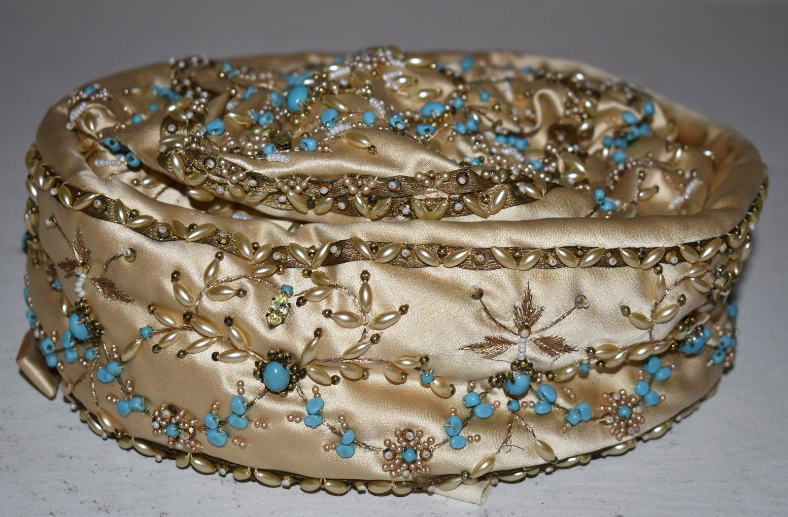 Cesare Canessa for Bergdorg Goodman Ladies Hat: of cream colored silk with embroidered gold thread, seed & other pearls, and turqouise. The front with central jeweled citrine.
