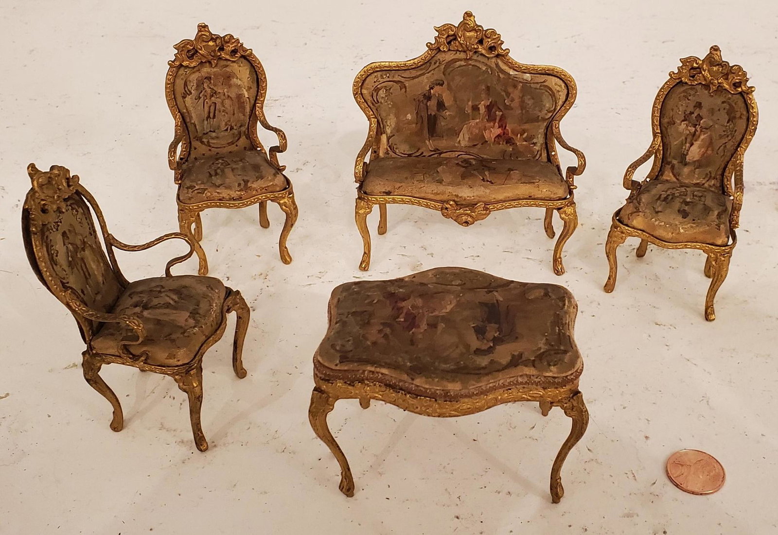 Antique Miniature Gilt Metal Parlor Suite: The table inscribed underneath Mary Antoinette's Table.