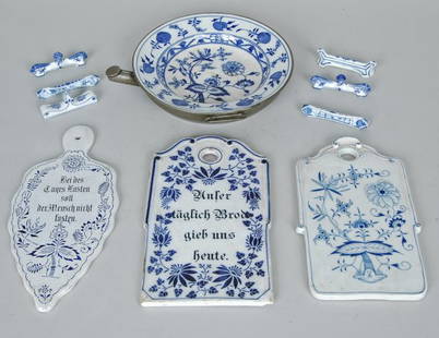 Lot Of Blue Onion Meissen Porcelain: Lot Of Blue Onion Meissen Porcelain one cutting board with Meissen crossword marks. Three Royal Copenhagen knife rests, three knife rests, probably Meissen. Length of large cutting board 10.75"