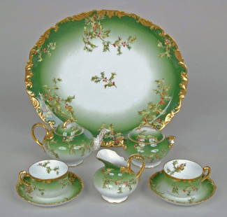 Fabulous Late 19th C. French Limoges Tea Set: Fabulous Late 19th C. French Limoges Tea Set consisting of oval tray, teapot, creamer, sugar & two cups and saucers all with ivy decoration on green field, wonderful gilt highlights. Tray 16.25" x 13.