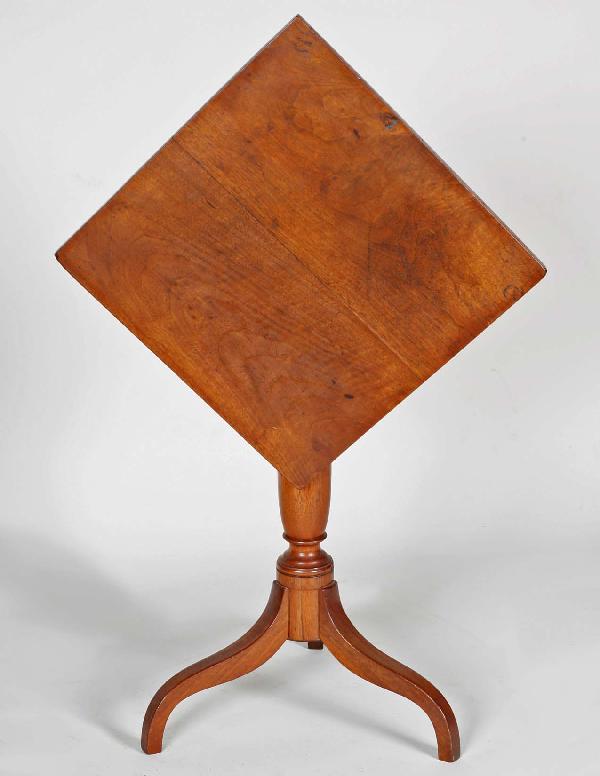 Virginia Federal Walnut Tilt Top Candle Stand: Virginia Federal Walnut Tilt Top Candle Stand, early 19th c., tilting diamond shaped top above ring and baluster turned shaft on three spider legs. Height 27.5" Top 19" X 18.75"