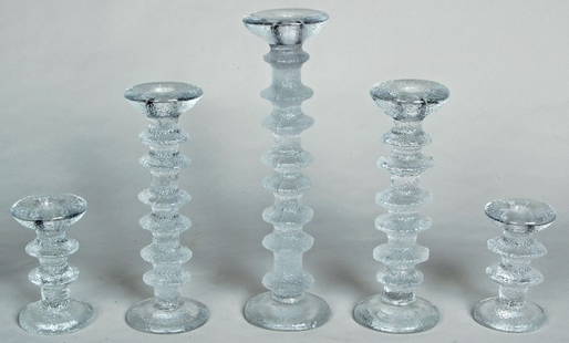 EERO SAARINEN, (1910-1961) 5 GRADUATED MOLDED GLASS: EERO SAARINEN, (1910-1961) 5 GRADUATED MOLDED GLASS CANDLESTICKS, Tallest H. 12 1/4" Medium 9 1/2" Smallest 5"