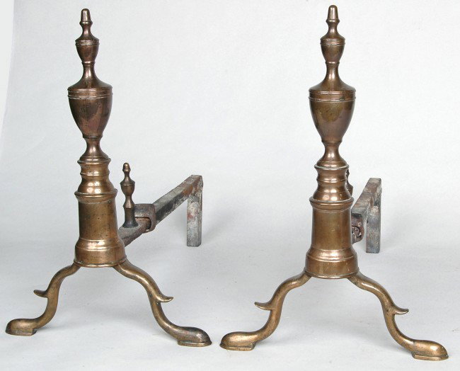 FINE PAIR BOSTON FEDERAL BELL METAL ANDIRONS doubl: FINE PAIR BOSTON FEDERAL BELL METAL ANDIRONS double urn form on cylindrical reverse tapering shaft on arched spurred legs ending in slipper feet. Note original billet bar and logstops. H. 15 1/2" D. 1