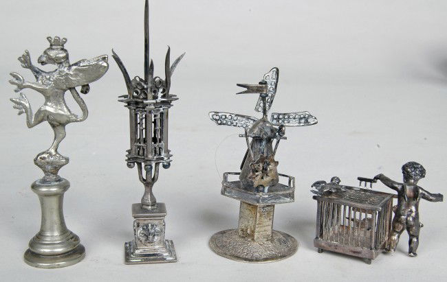 3 PCS. MINIATURE SILVER, 19TH C. monstrance H. 3 1: 3 PCS. MINIATURE SILVER, 19TH C. monstrance H. 3 1/2", Windmill 2 1/2" Pewter rampant lion 2 7/8", Winged Cherub w/cage