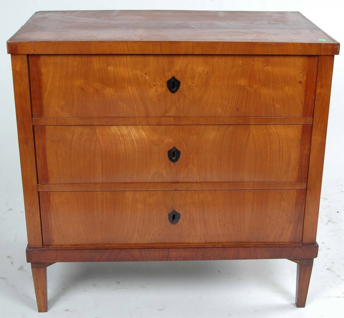 BIEDERMEYER FRUITWOOD LOUIS XVI CHEST: BIEDERMEYER FRUITWOOD LOUIS XVI CHEST, the rectangular top above three drawers with ebony inlaid escutcheons on square tapering legs. Ht. 32.5" Top 32.5" x 18.5" Provenance: The estate of Ethelbert Ot
