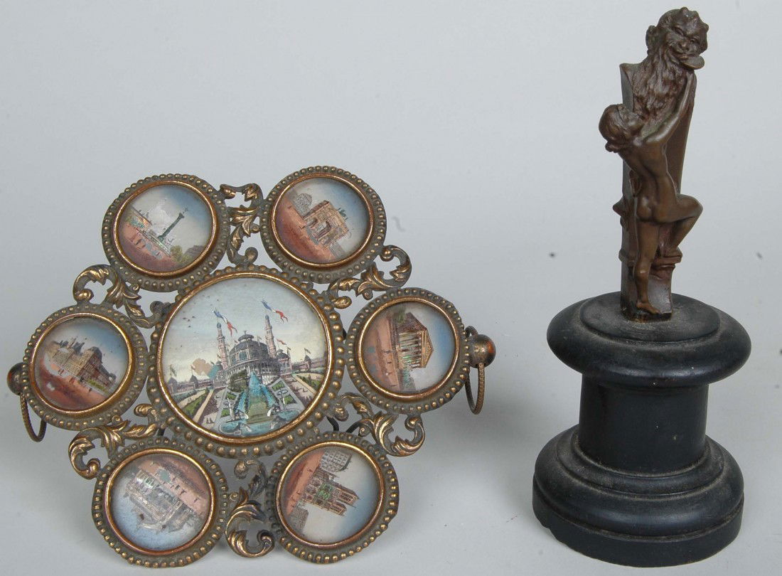 FRENCH 19TH C. BRASS TRIVET W/WONDERS OF WORLD,: FRENCH 19TH C. PALAIS ROYAL BRASS TRIVET W/WONDERS OF WORLD, BRONZE NUDE CLIMBING SATAN ON PEDESTAL. D. 6.5"; Ht. 6.5" Provenance: The estate of Ethelbert Ott, Kotobuki Farms, Landenberg, PA