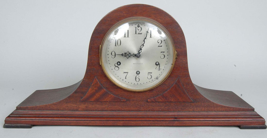 SETH THOMAS HUMPBACK MANTLE CLOCK: SETH THOMAS HUMPBACK MANTLE CLOCK, works marked no. 124 complete with pendulum & key. L. 20.5" Ht. 9.5" D. 6" Provenance: From the collection of Dr. Benjamin Weiner, longtime proprietor of Claymont An