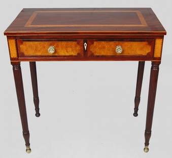 NEW YORK SHERATON SERVING TABLE: profusely inlaid with single drawer, raised on tapering turned reeded frontal legs ending in brass ball feet. First quarter of the 19th century. Ht. 32 1/2", W. 32", D. 18"