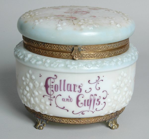 WAVECREST COLLARS AND CUFFS BOX: of circular form, with raised and painted floral decoration. Ht. 6 1/2", Dia. 7".