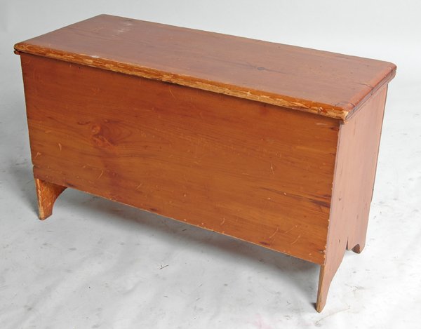 DIMINUTIVE EARLY 19TH C. PINE BLANKET CHEST: hinge molded lid, with bootjack ends. Ht. 18 1/2", W. 31 1/2", D. 13". Provenance: The Auerbach Estate Syosset, NY.