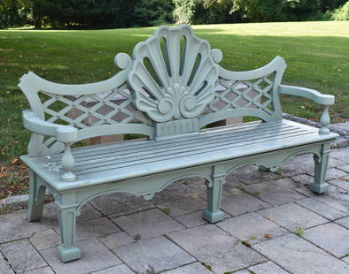 CHATSWORTH CHIPPENDALE STYLE TEAK GARDEN BENCH: A light green painted "Chatsworth Carpenters" "House & Garden" design Windsor garden bench. The bench with pierced diaper patterned back centering an openwork carved scallop shell, scroll form