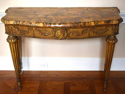 IMPORTANT 18TH CENTURY LOUIS XIV CONSOLE TABLE: CONSOLE TABLE. The molded variegated Sienna bowfront marble top with serpentine sides above a conforming frieze with central boss featuring a Roman emperor with bellflower and ribbon decoration restin