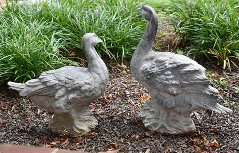 FINE PAIR OF CAST ZINC FIGURAL GARDEN DUCKS: Naturalistic form standing on rocky outcropping. Weathered patina. Height 18 3/4" x 17" Height 15 1/2" x 15"